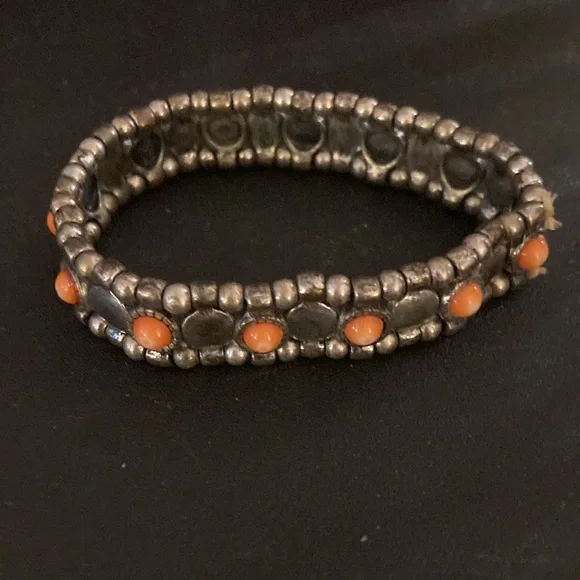 Silver toned bracelet with pink embellishments - Picture 2 of 3